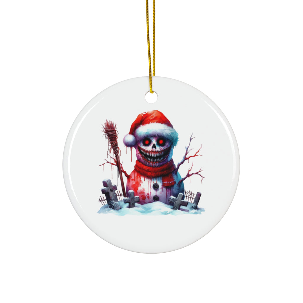 Ceramic ornament with a grinning snow creature in a worn Santa hat surrounded by gravestones and winter branches.