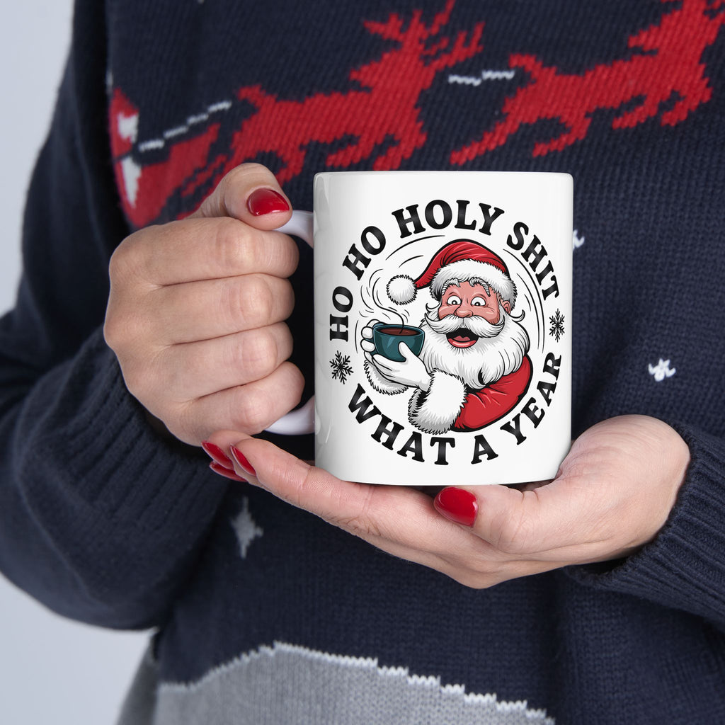 Close-up of glossy mug surface highlighting vivid full-color print of Santa and bold lettering, showing durable white ceramic and comfortable C-handle.