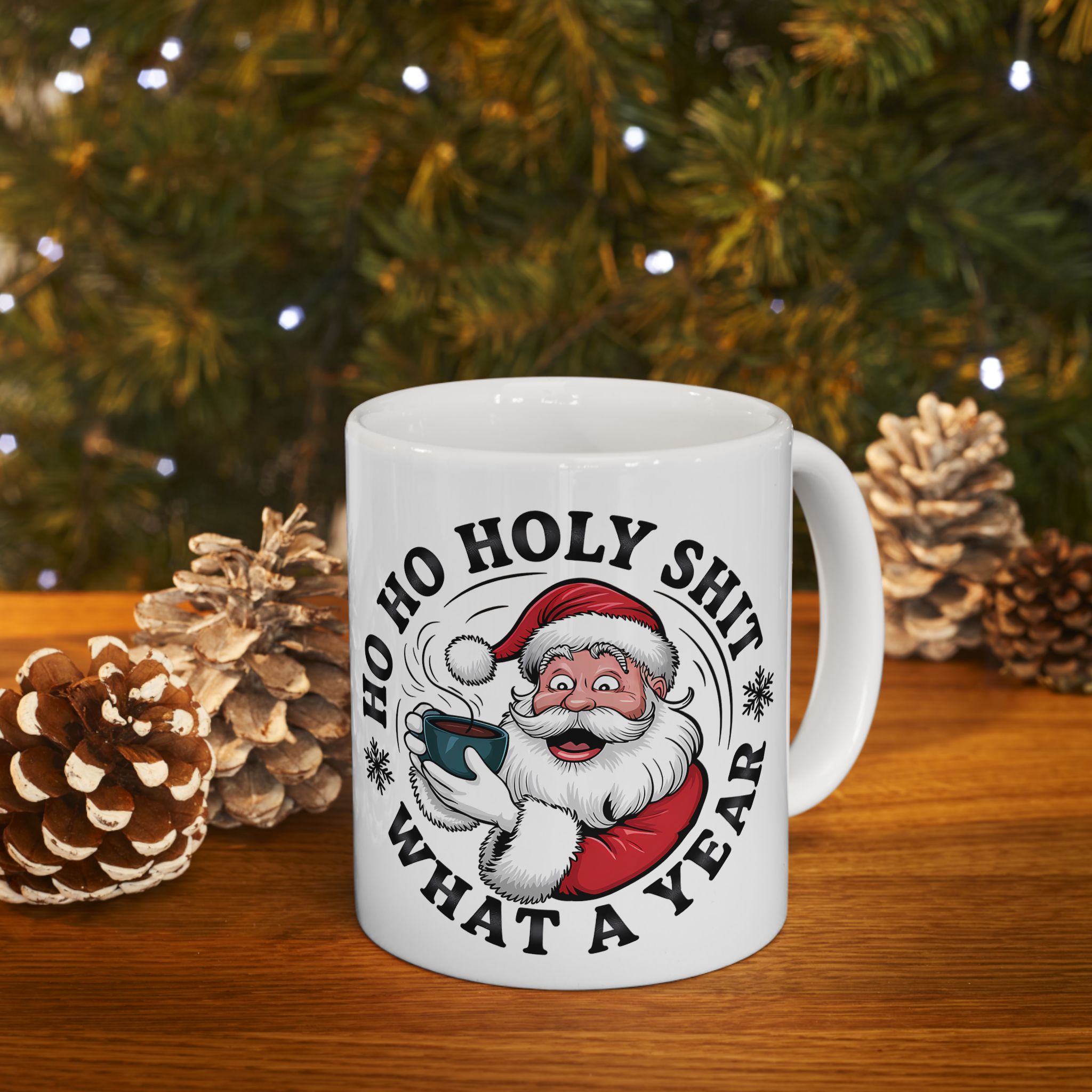 Glossy 11oz ceramic mug with mischievous Santa holding a cup of cocoa, bold circular lettering reading "Ho Ho Holy Shit, What a Year", bright full-color print on white ceramic, perfect funny holiday coffee cup.