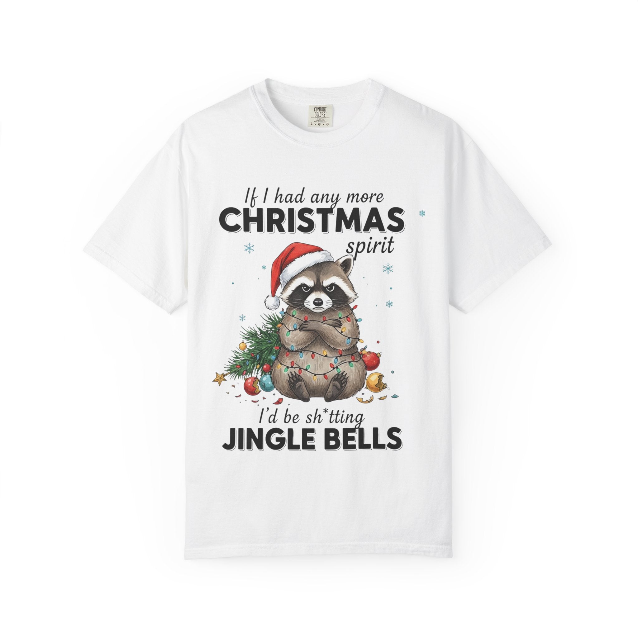 Unisex garment-dyed t-shirt showing grumpy raccoon tangled in Christmas lights, text above "If I had anymore Christmas spirit…" and below "I’d be sh*tting jingle bells", soft cotton relaxed fit.