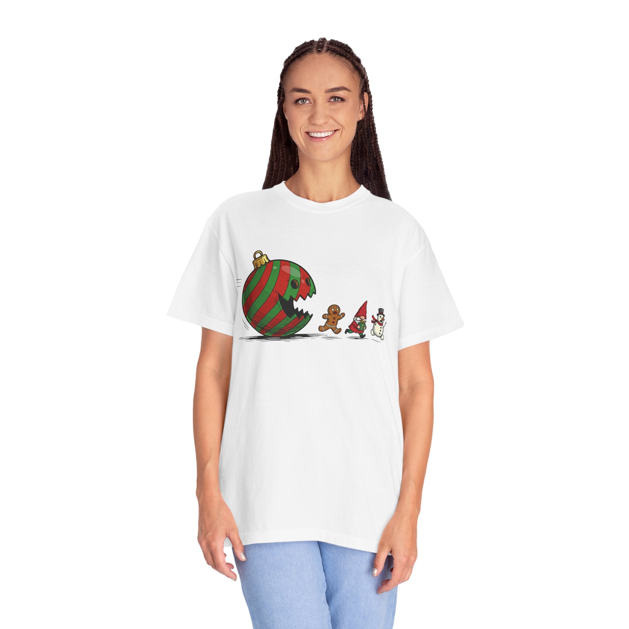 Model wearing the t-shirt styled with cozy winter layers, showing the ornament chasing the gingerbread, gnome, and snowman, perfect for casual holiday outings or festive indoor fun.